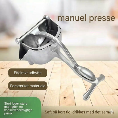 Manuell citruspresser med vægtstang