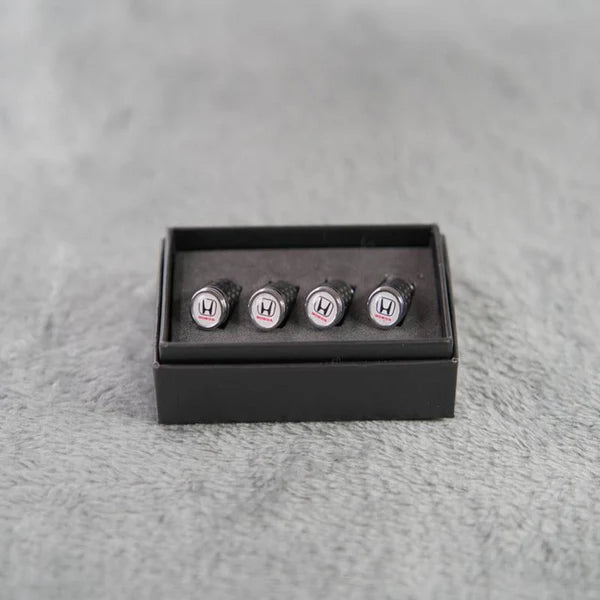 Luksus ventilhættesæt i kulfiberstil – Kulfiberlook – Universel til bil, motorcykel og cykel – Sporty hjulbeskyttelse – [4 stk.]