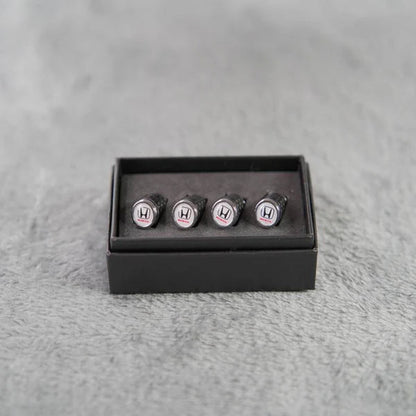 Luksus ventilhættesæt i kulfiberstil – Kulfiberlook – Universel til bil, motorcykel og cykel – Sporty hjulbeskyttelse – [4 stk.]