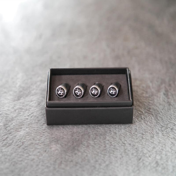 Luksus ventilhættesæt i kulfiberstil – Kulfiberlook – Universel til bil, motorcykel og cykel – Sporty hjulbeskyttelse – [4 stk.]