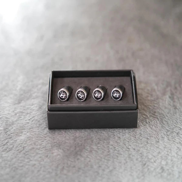 Luksus ventilhættesæt i kulfiberstil – Kulfiberlook – Universel til bil, motorcykel og cykel – Sporty hjulbeskyttelse – [4 stk.]