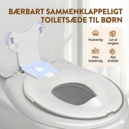 Bærbart, sammenklappeligt toiletsæde til børn